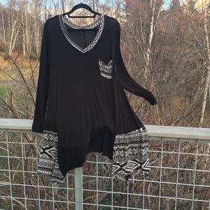 Tunic handkerchief hem.